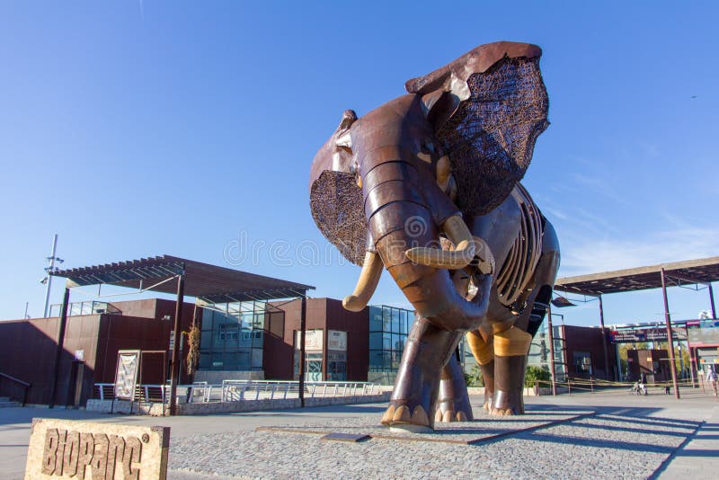 VALENCIA, SPAIN - JANUARY 19, 2019: Big sculpture of an elephant, made with wood and iron, at the main entrance of Bioparc zoo in royalty free stock image VALENCIA, SPAIN - JANUARY 19, 2019: Big sculpture of an elephant, made with wood and iron, at the main entrance of Bioparc zoo in royalty free stock image