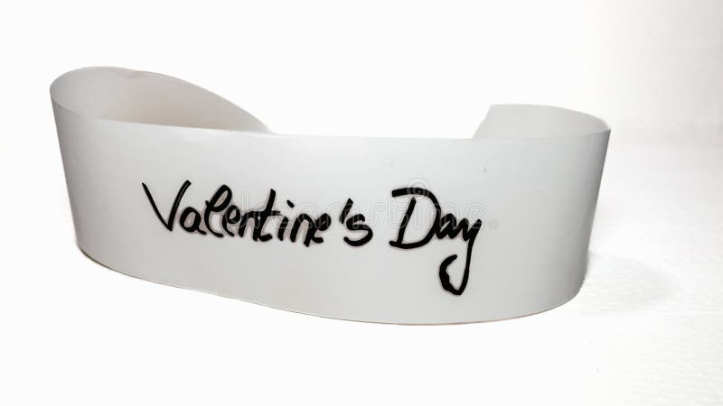 Handwriting text Valentine`s day.  Label tag with lovely message. Romantic love concept for Valentine`s day. Handwriting text Valentine`s day.  Label tag with lovely message. Romantic love concept for Valentine`s day