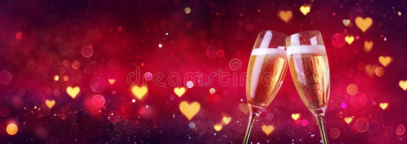 Valentines Celebration With Champagne Flutes With Defocused Lights In Red Shiny Background. Valentines Celebration With Champagne Flutes With Defocused Lights In Red Shiny Background