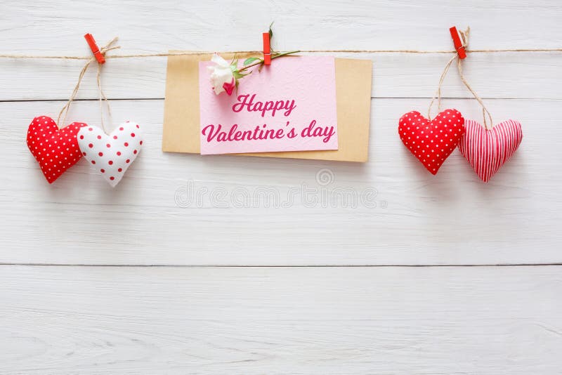 Valentine day background, hearts border on wood, copy space