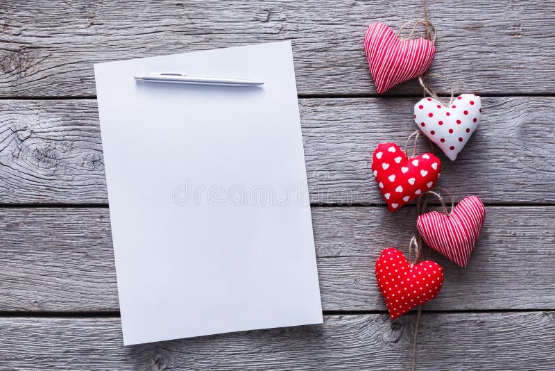 Valentine day letter background, hearts bunch on wood, copy space
