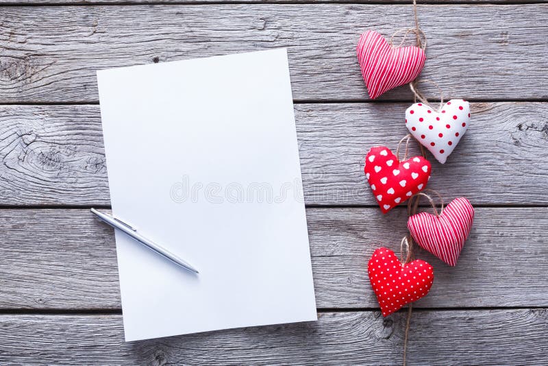 Valentine day letter background, hearts bunch on wood