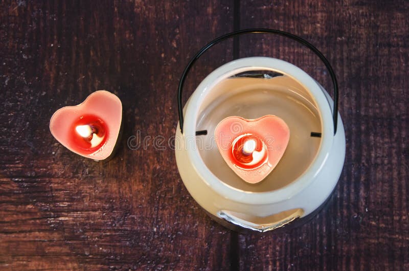 Valentine`s Day, burning candles in the form of hearts stock images Valentine`s Day, burning candles in the form of hearts stock images