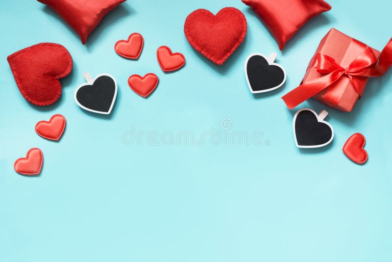 Valentine`s day card. Composition with gifts, red heart on blue. Top view. Copy space. stock photography Valentine`s day card. Composition with gifts, red heart on blue. Top view. Copy space. stock photography