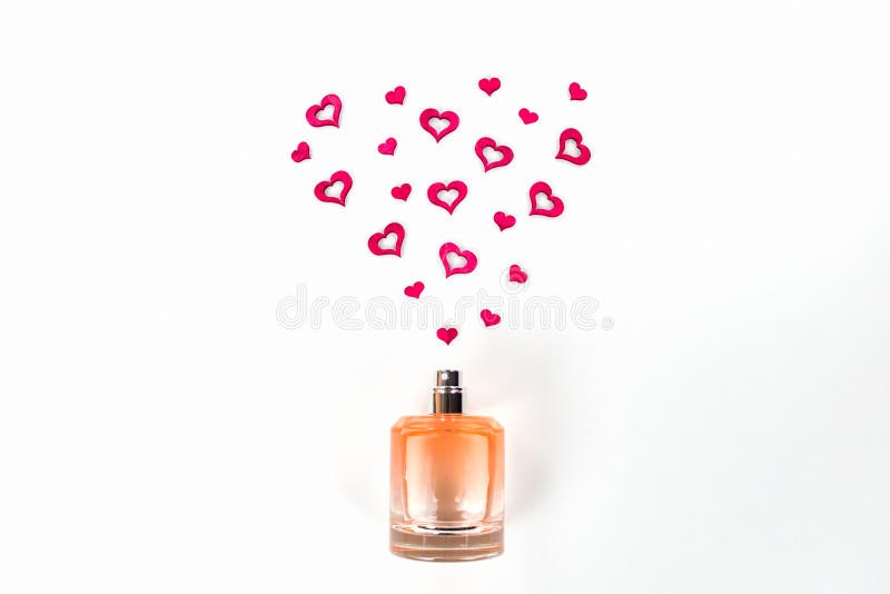 Bottle of perfume with red hearts flying out from it.