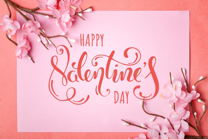 Valentine`s day. Greeting card on coral background. Selective focus. Horizontal. stock images