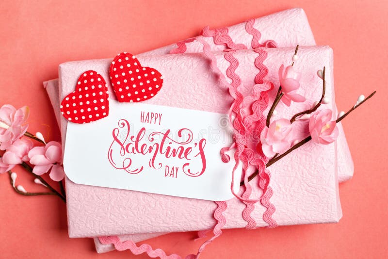 Valentine`s day. Greeting card on coral background. Selective focus. Horizontal. stock images