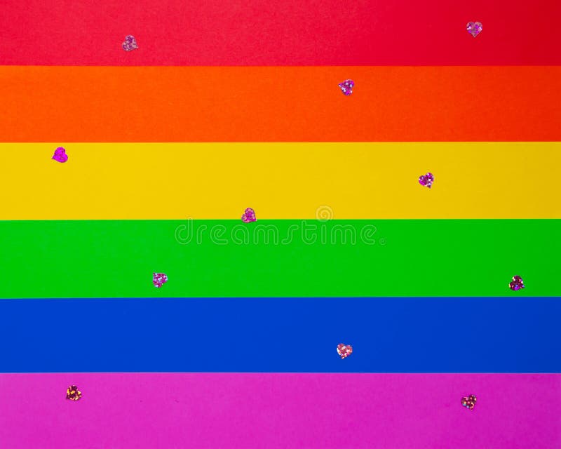 Valentine`s Day LGBT background. Rainbow LGBT flag with glittering hearts. Holiday party concept. Mockup for greetings stock photos Valentine`s Day LGBT background. Rainbow LGBT flag with glittering hearts. Holiday party concept. Mockup for greetings stock photos