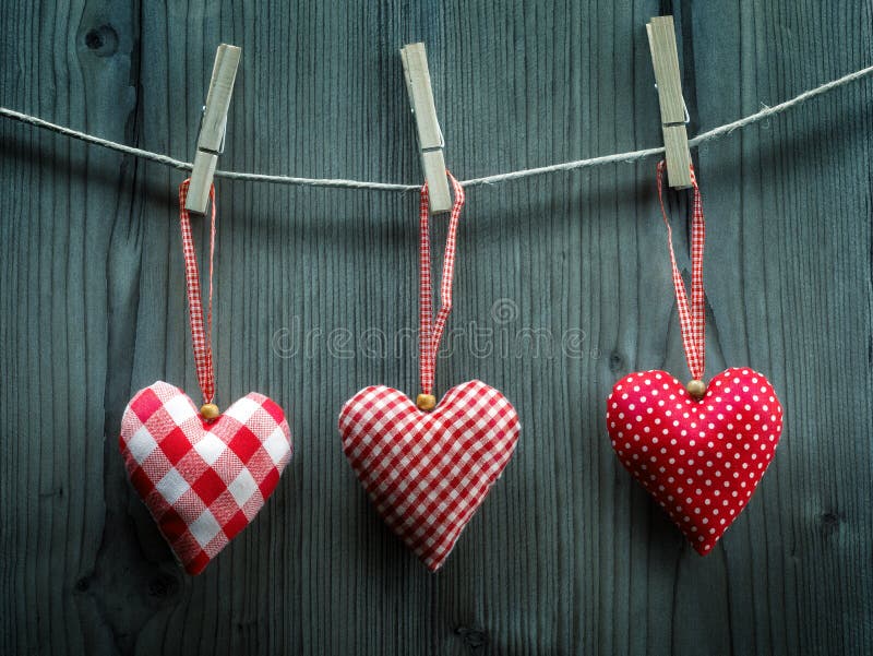 Valentine's Day wallpaper - Textile hearts hanging on the rope