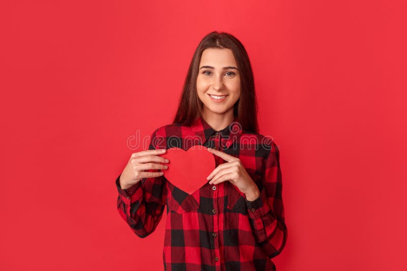 Valentine`s Day. Young Woman Standing Isolated on Red with Heart Card ...