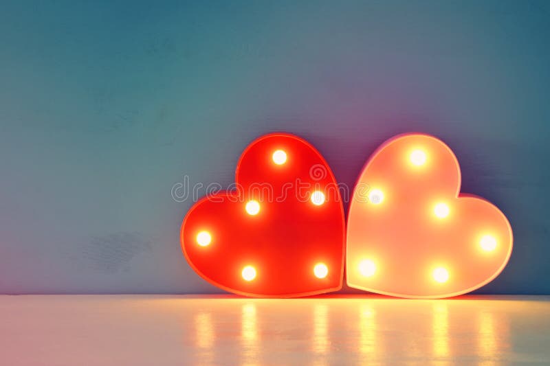 Valentine& x27;s day background with led glowing hearts.