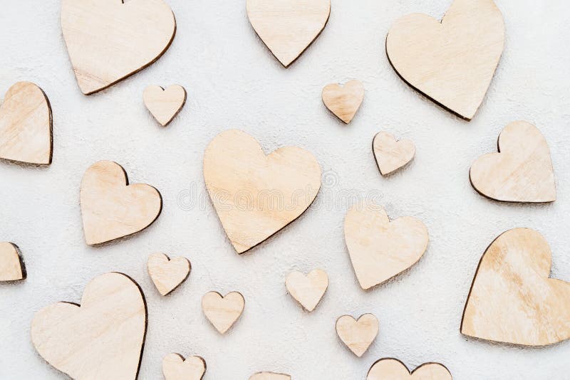 Valentines Day background with wooden hearts on a concrete background, top view. Valentines Day concept royalty free stock image Valentines Day background with wooden hearts on a concrete background, top view. Valentines Day concept royalty free stock image
