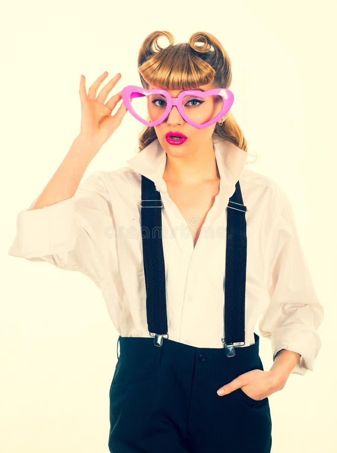 Valentines day concept. Girl in heart shaped glasses. Beautiful girl in pink glasses. Love concept.