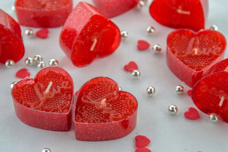 Small Red Candles in the Shape of a Heart. Stock Photo Image of