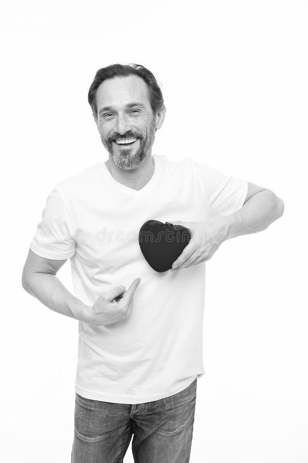 Valentines day. Health care. Mature bearded man with red heart. heart transplant. Holiday celebration. Love. problems stock photo Valentines day. Health care. Mature bearded man with red heart. heart transplant. Holiday celebration. Love. problems stock photo