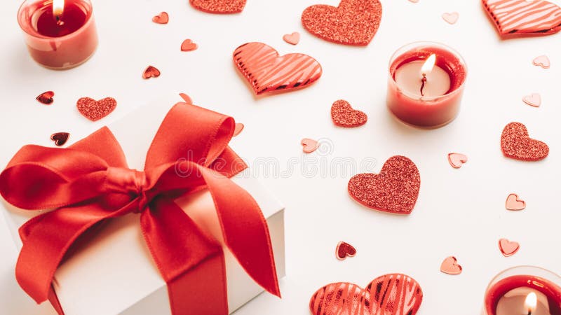 Valentines day heart  romantic gift box  red love candle on white background. Sainte Valentine  mothers day  birthday greeting