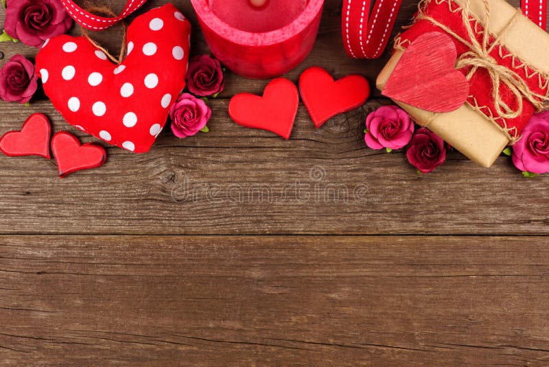 Two wooden hearts on rustic wood background. Valentines days concept.  Greeting card with copy space. Stock Photo by natika