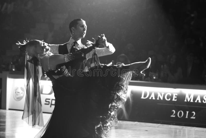 BUCHAREST - APRIL 01: Emanuel Valeri and Tania Kehlet, the World Ballroom Standard Champions performing a Viennese Waltz at WDSF (World Dance Sport Federation) Dance Masters on April 01, 2012 in Bucharest, Romania. BUCHAREST - APRIL 01: Emanuel Valeri and Tania Kehlet, the World Ballroom Standard Champions performing a Viennese Waltz at WDSF (World Dance Sport Federation) Dance Masters on April 01, 2012 in Bucharest, Romania