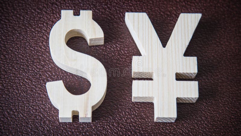 Valutazione di scambio Dollaro, Yen su fondo di cuoio fotografie stock Valutazione di scambio Dollaro, Yen su fondo di cuoio fotografie stock