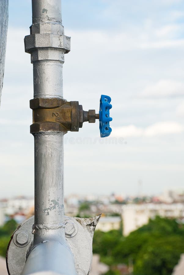 Valve with water pipe stock photo. Image of pipeline 26909254