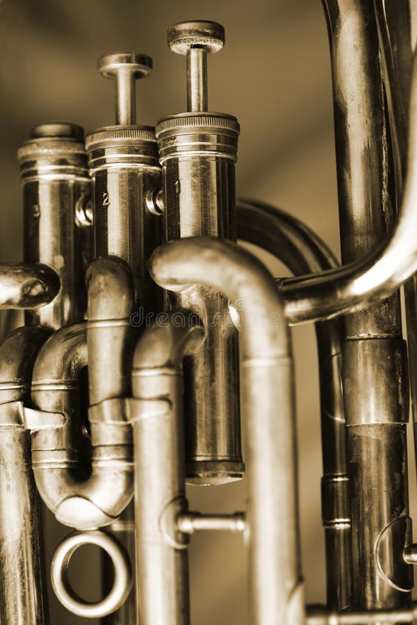 Valves of an old baritone horn. Valves of an old baritone horn