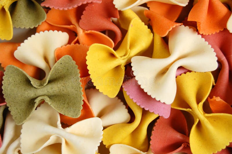 Farfalle vlinders, pasta, voedselachtergrond stock afbeeldingen