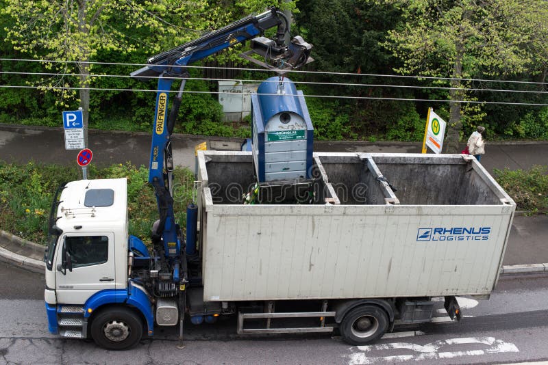 Van emptying glass recycling container royalty free stock photos Van emptying glass recycling container royalty free stock photos