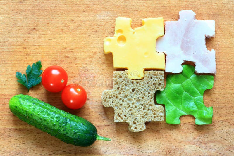Van het de ingrediëntendieet van het voedselraadsel het creatieve concept stock afbeeldingen Van het de ingrediëntendieet van het voedselraadsel het creatieve concept stock afbeeldingen