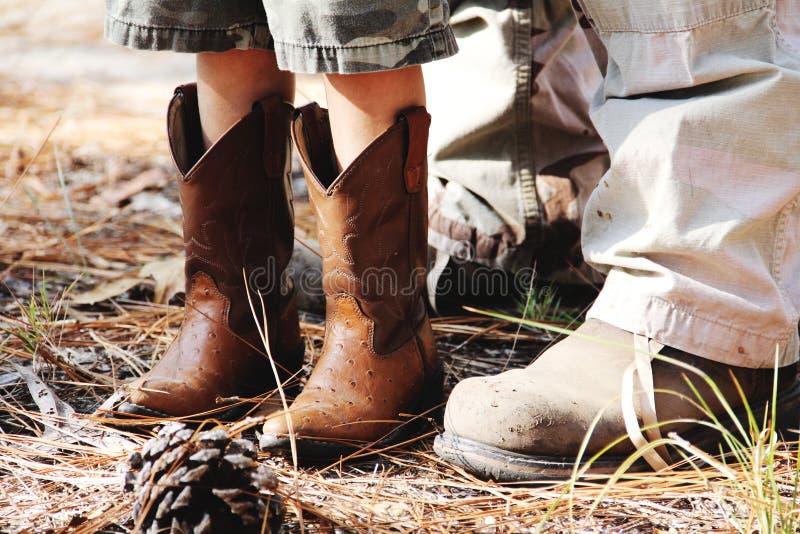 Van het het jonge geitjewerk van cowboylaarzen de laarzenmens royalty-vrije stock afbeelding Van het het jonge geitjewerk van cowboylaarzen de laarzenmens royalty-vrije stock afbeelding