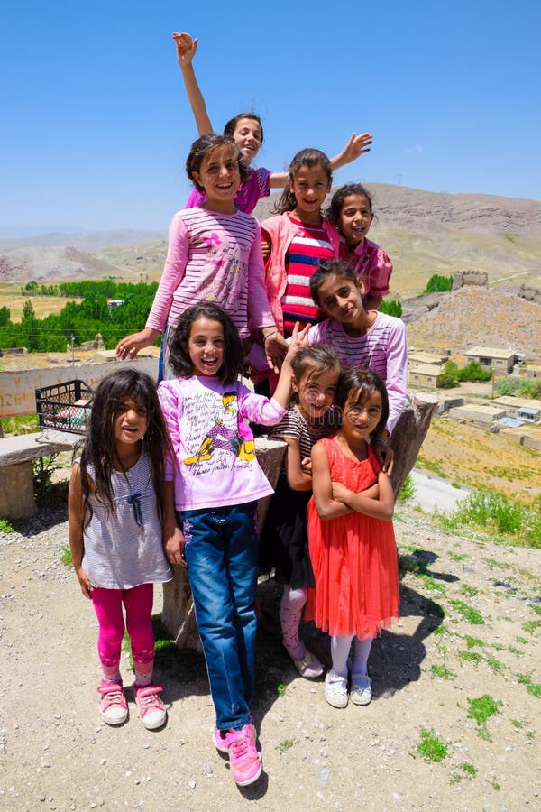 Van, Turkey-July 7, 2015: Happy Kurdish girls are smiling for pictures royalty free stock photo Van, Turkey-July 7, 2015: Happy Kurdish girls are smiling for pictures royalty free stock photo