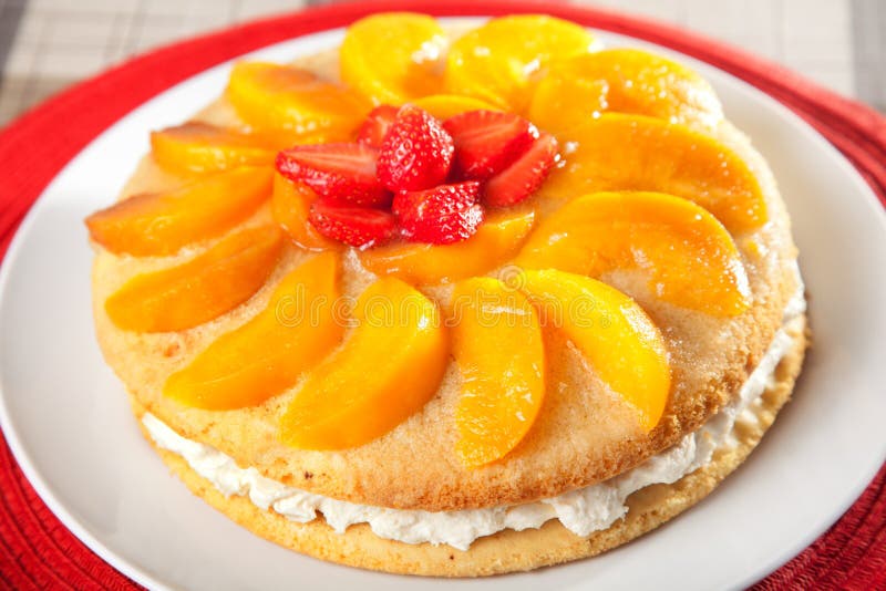 Vanilla cake with peaches stock image. Image of meal 49599645