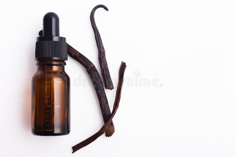 Vanilla Essential Oil in Amber Bottle with Vanilla Beans and Dropper Stock Image Image of