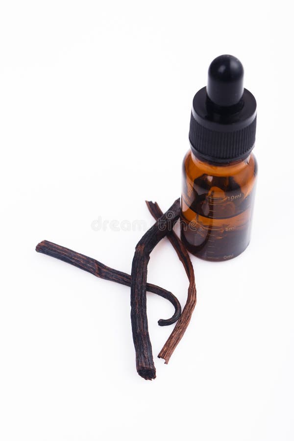 Vanilla Essential Oil in Amber Bottle with Vanilla Beans and Dropper Stock Image Image of