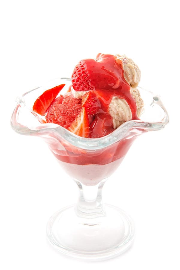 Vanilla ice cream with strawberries and topping in glass, exclusive dessert, summer, patisserie royalty free stock photography Vanilla ice cream with strawberries and topping in glass, exclusive dessert, summer, patisserie royalty free stock photography