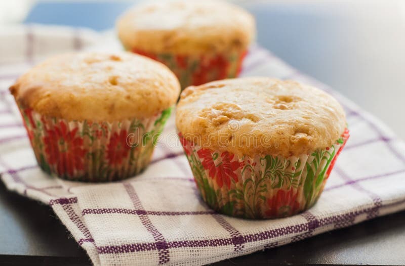 Vanilla Muffins Cupcakes with White Chocolate on a Towel Stock Image ...
