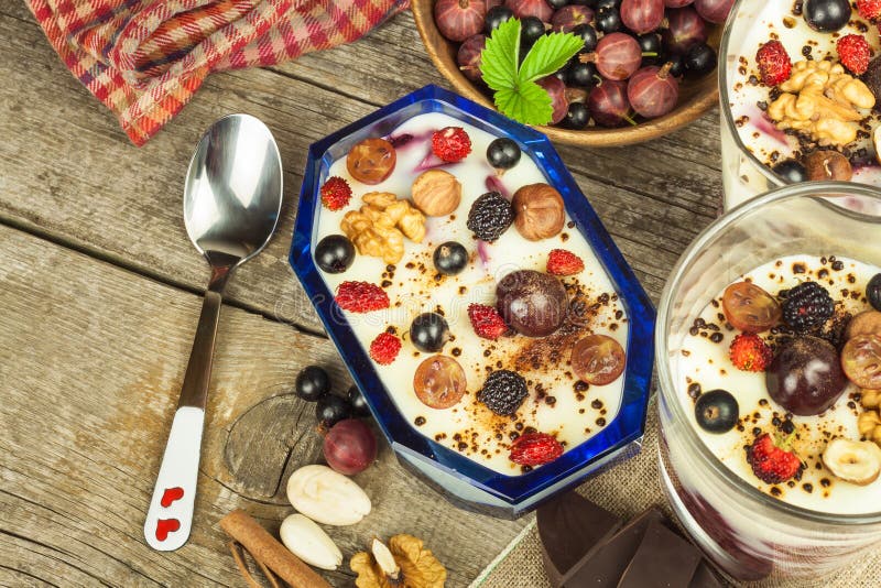 Vanilla Pudding with Summer Fruit on a Wooden Table. Healthy Snacking