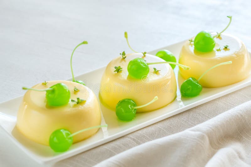 Vanilla Puddings Decorated with Cocktail Cherries Stock Image Image