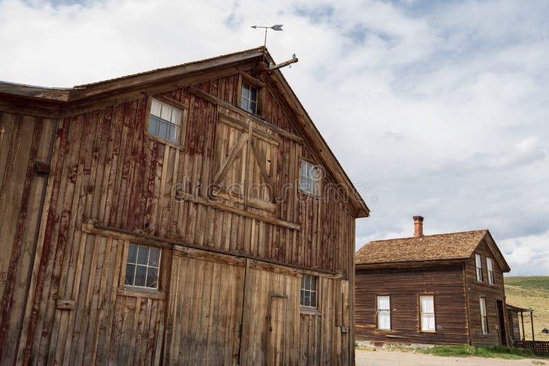 Vanne météorologique à la grange dans la ville fantôme de Bodie, Californie, États-Unis photos libres de droits Vanne météorologique à la grange dans la ville fantôme de Bodie, Californie, États-Unis photos libres de droits