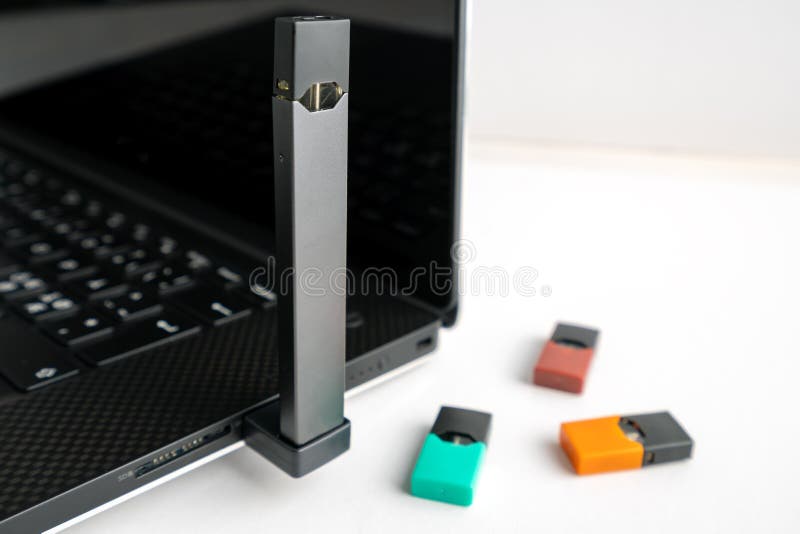 Vape pod in male hand or pod mod close up - newest generation of vaping  products Stock Photo by ©DedMityay 313624900