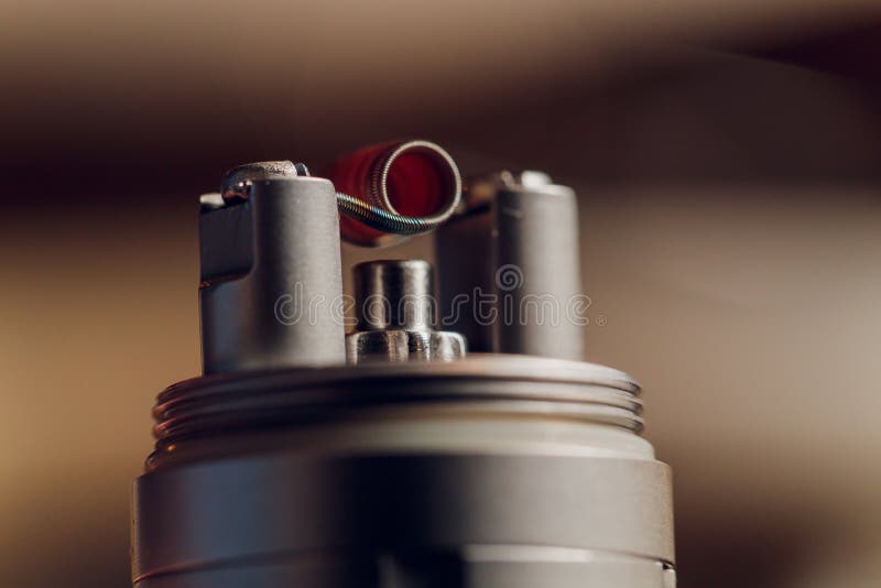 Vaping Device with a Hot Spring on a Black Background for Evaporation