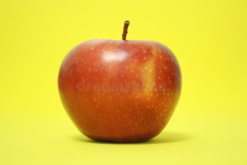 RED APPLE on YELLOW stock photo. Image of healthy, toeat 150720620