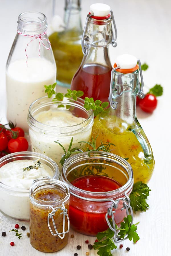 Assortment of homemade salad dressings and sauce. Assortment of homemade salad dressings and sauce