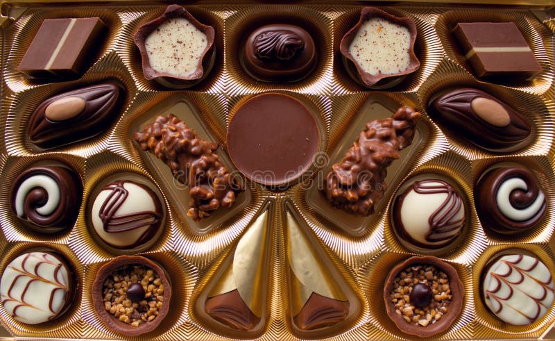 Variety of chocolate candies. Luxurious box of chocolates. stock photography Variety of chocolate candies. Luxurious box of chocolates. stock photography