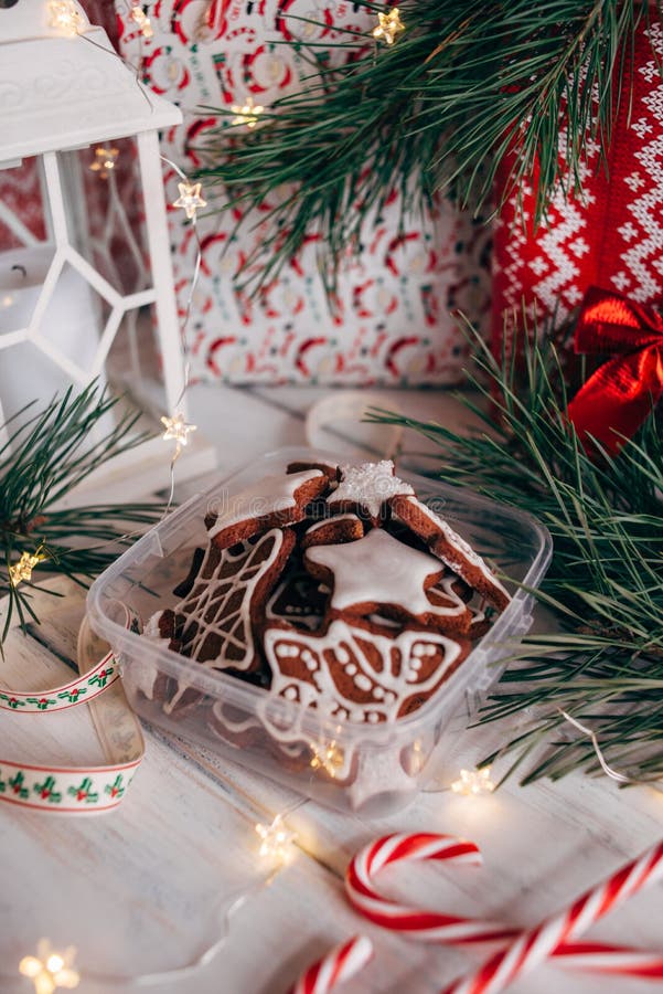 A variety of Christmas gingerbread cookies are laid out on a white wooden background stock images A variety of Christmas gingerbread cookies are laid out on a white wooden background stock images