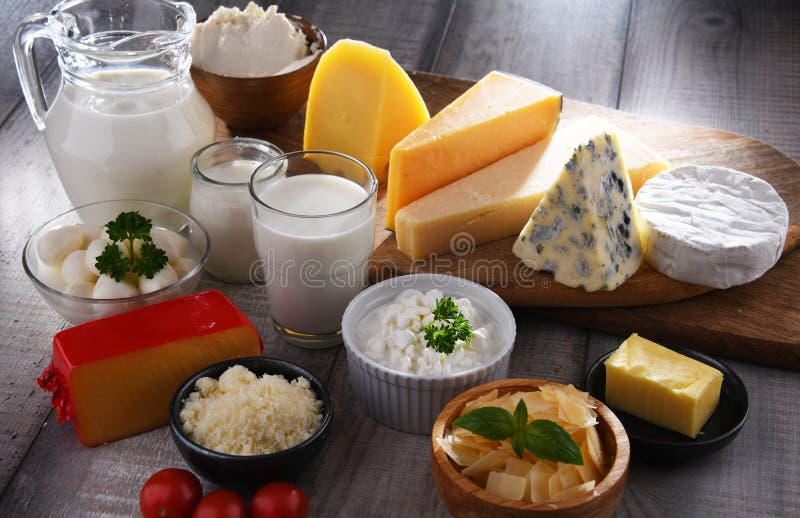 A Variety of Dairy Products Including Cheese, Milk and Yogurt Stock