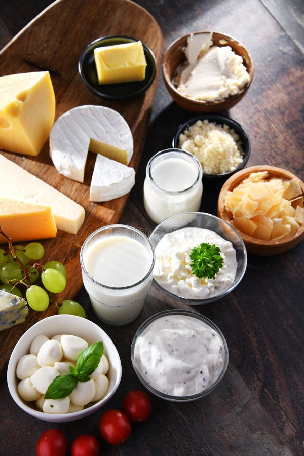 A Variety of Dairy Products Including Cheese, Milk and Yogurt Stock