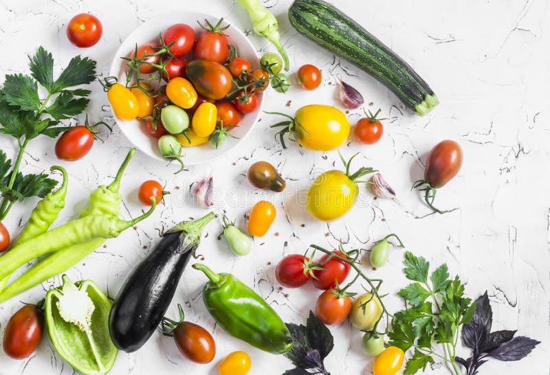 Variety of fresh vegetables - tomatoes, peppers, eggplant, zucchini on a white background stock photo Variety of fresh vegetables - tomatoes, peppers, eggplant, zucchini on a white background stock photo
