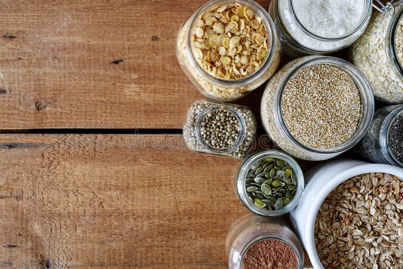 Variety of mueslis in jars variety of healhty organic grains