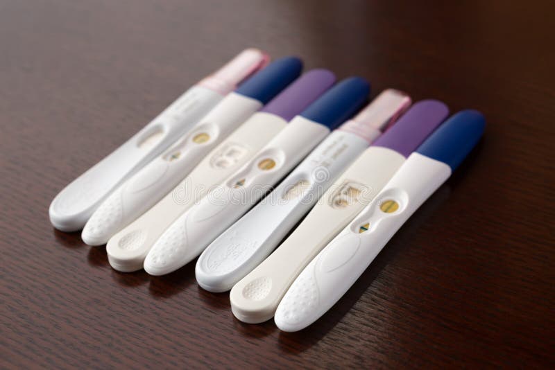 Variety of Pregnancy Tests Lined Up Side by Side Stock Photo Image of