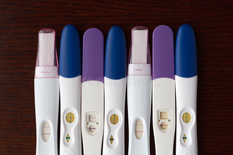 Variety of Pregnancy Tests Lined Up Side by Side Stock Photo Image of